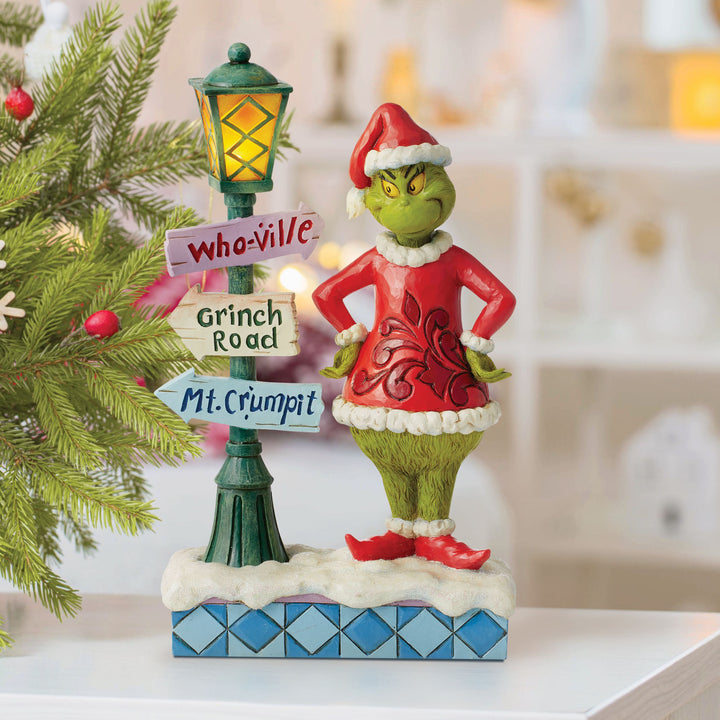Jim Shore The Grinch: Grinch with Lit Lamppost and Street Sign Figurine sparkle-castle