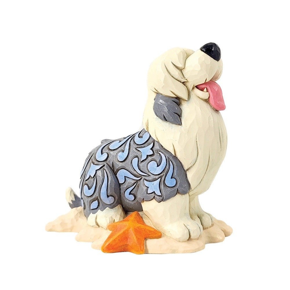 Jim Shore Disney Traditions: Max Figurine sparkle-castle