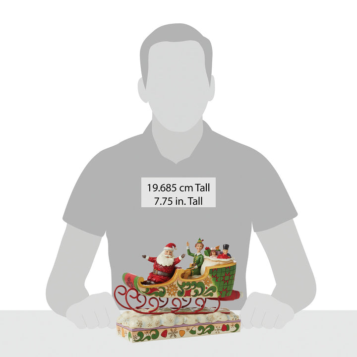 Jim Shore Elf: Buddy Elf with Santa in Sleigh Figurine sparkle-castle