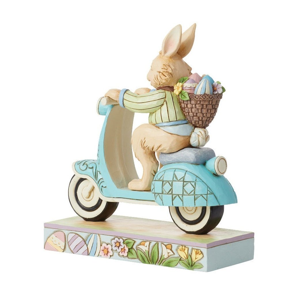 Jim Shore Heartwood Creek: Easter Bunny Riding Scooter Figurine sparkle-castle