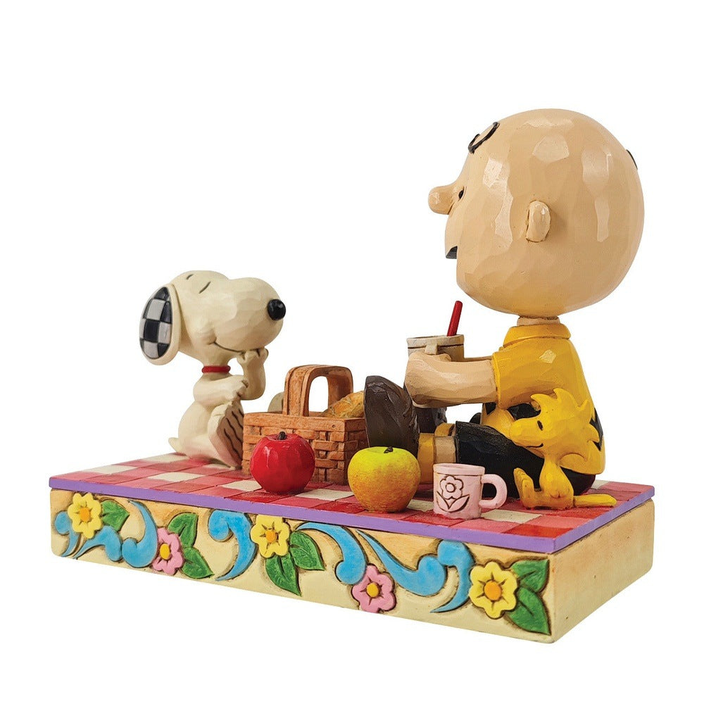Jim Shore Peanuts: Snoopy, Charlie Brown & Woodstock On Picnic Figurine sparkle-castle