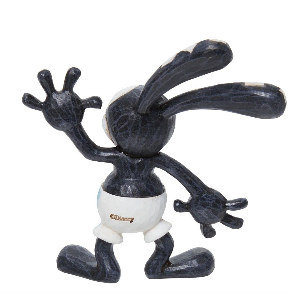 Jim Shore Disney Traditions: Mini Oswald Figurine sparkle-castle