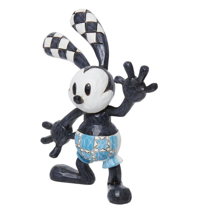 Jim Shore Disney Traditions: Mini Oswald Figurine sparkle-castle
