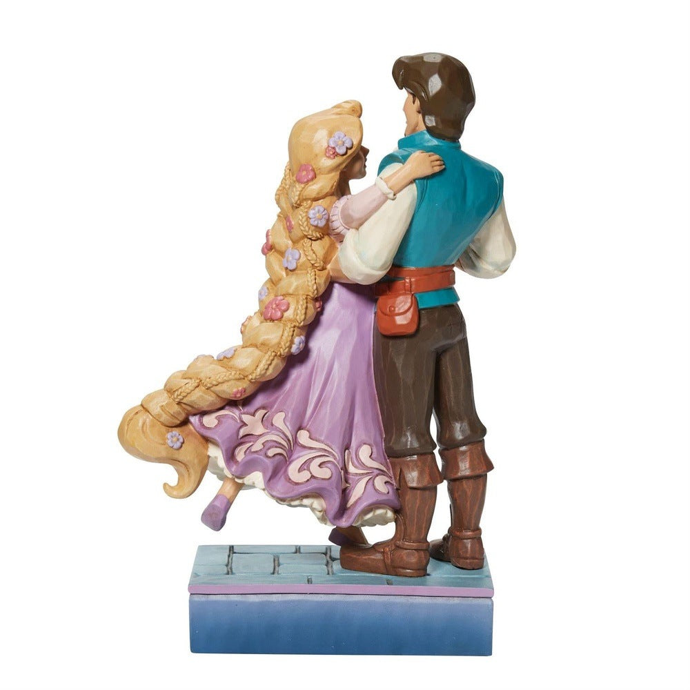 Jim Shore Disney Traditions: Rapunzel & Flynn Rider In Love Figurine sparkle-castle