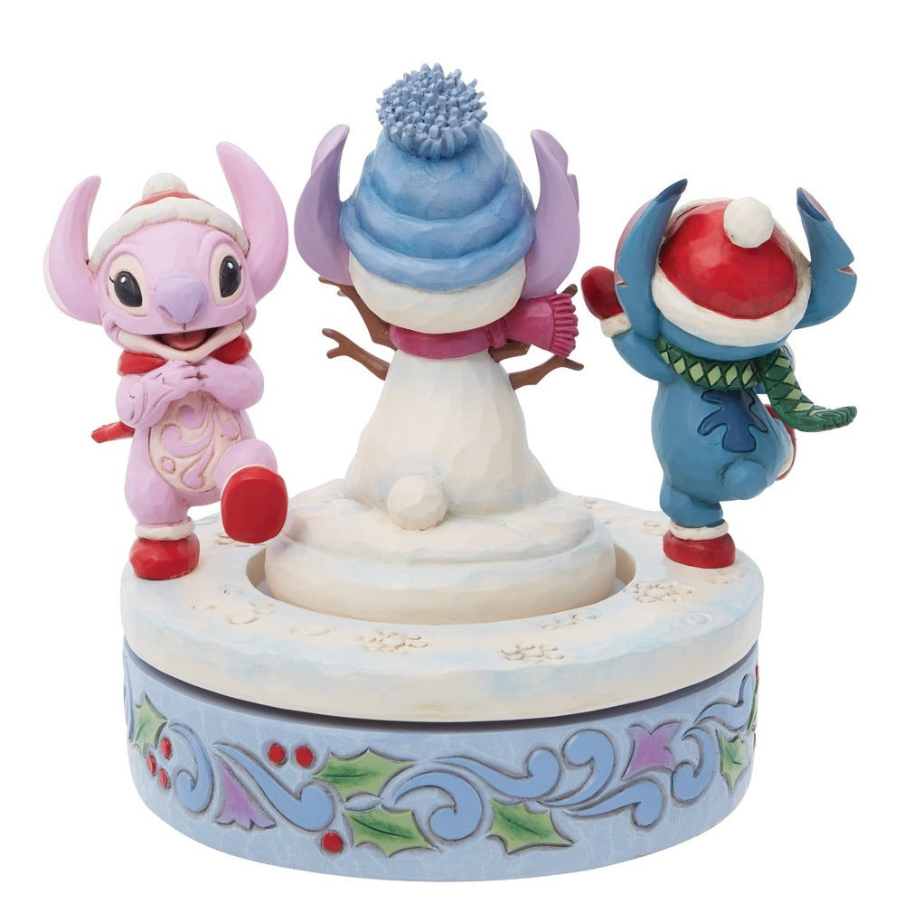 Jim Shore Disney Traditions: Stitch & Angel with Snowman Rotator Figurine sparkle-castle