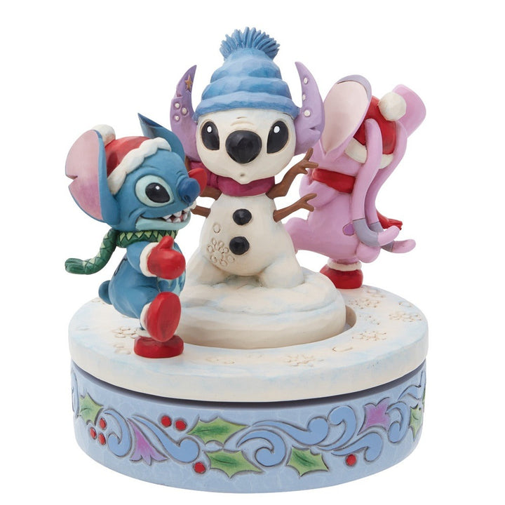 Jim Shore Disney Traditions: Stitch & Angel with Snowman Rotator Figurine sparkle-castle