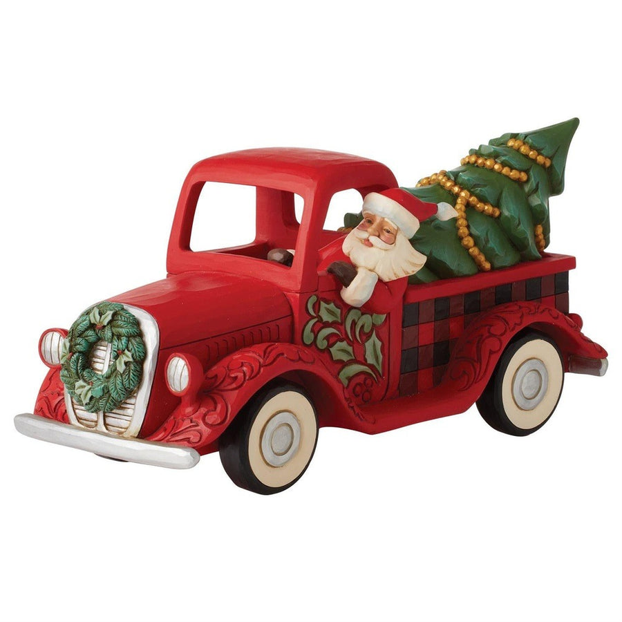 Jim Shore Heartwood Creek: Highland Glen Santa in Plaid Truck Figurine sparkle-castle