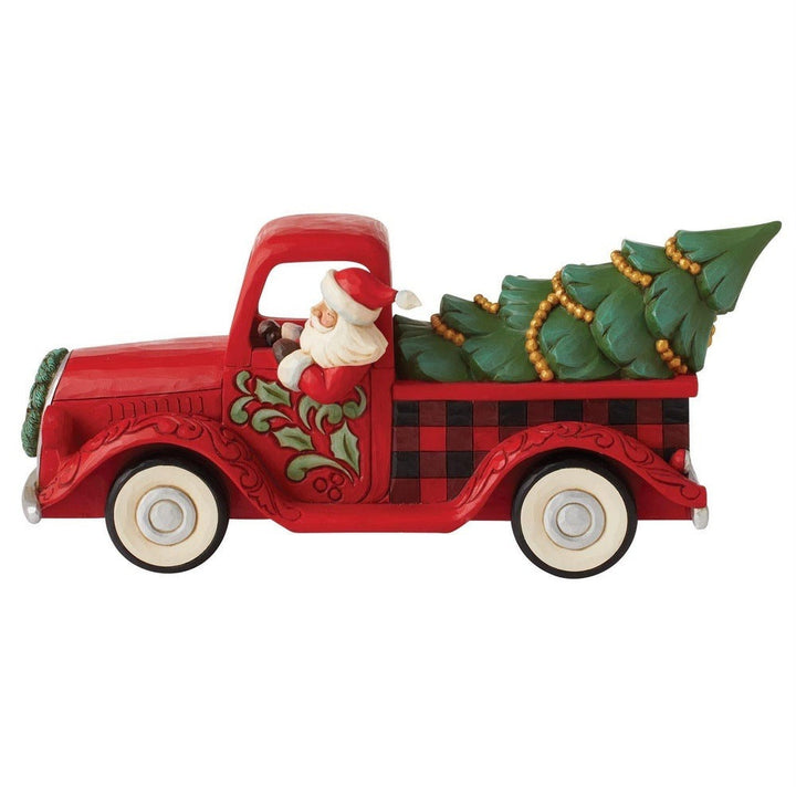 Jim Shore Heartwood Creek: Highland Glen Santa in Plaid Truck Figurine sparkle-castle