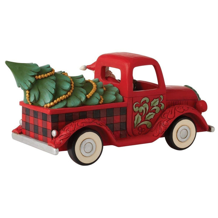 Jim Shore Heartwood Creek: Highland Glen Santa in Plaid Truck Figurine sparkle-castle