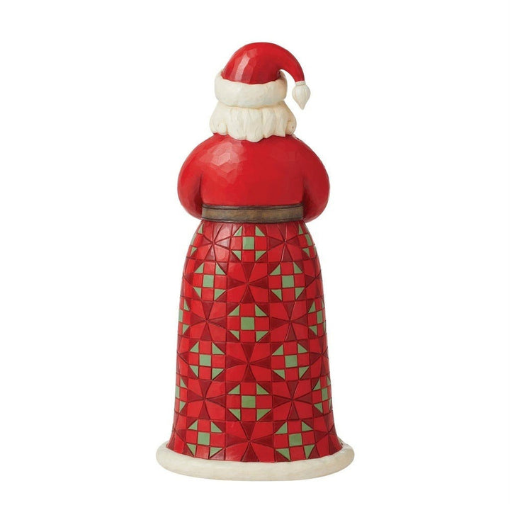 Jim Shore Heartwood Creek: Santa with Christmas Tree Coat Figurine sparkle-castle