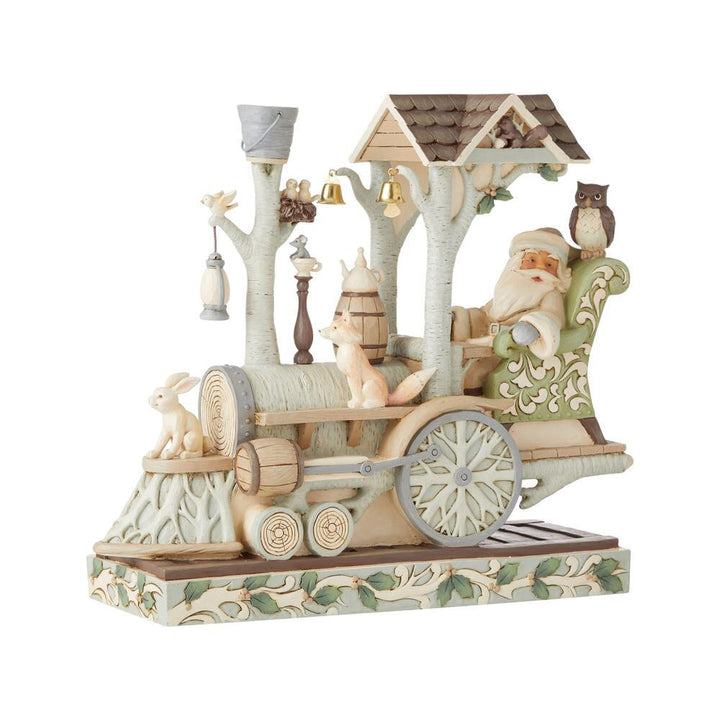 Jim Shore Heartwood Creek: White Woodland Santa Train Engine Figurine sparkle-castle