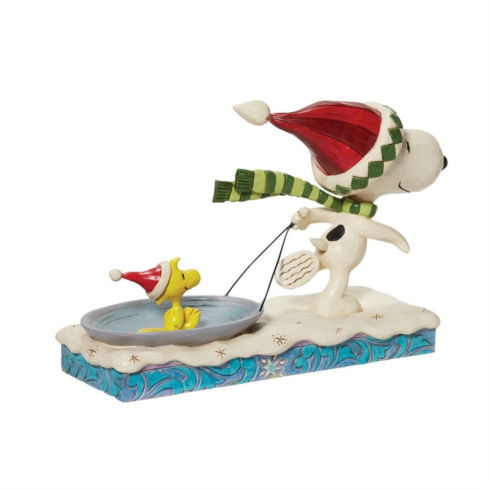 Jim Shore Peanuts: Snoopy Pulling Woodstock on Saucer Figurine sparkle-castle