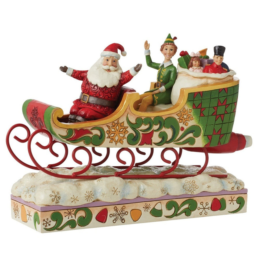 Jim Shore Elf: Buddy Elf with Santa in Sleigh Figurine sparkle-castle