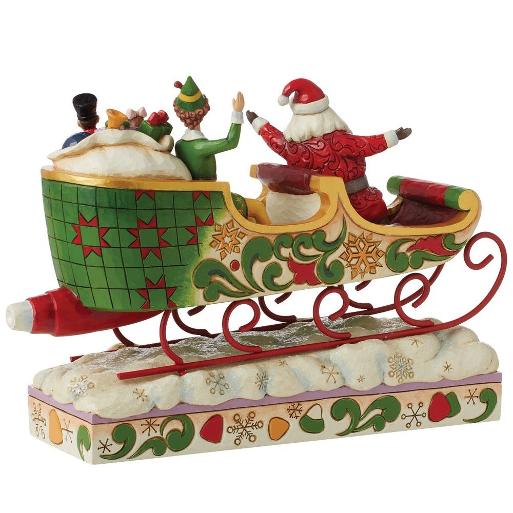 Jim Shore Elf: Buddy Elf with Santa in Sleigh Figurine sparkle-castle