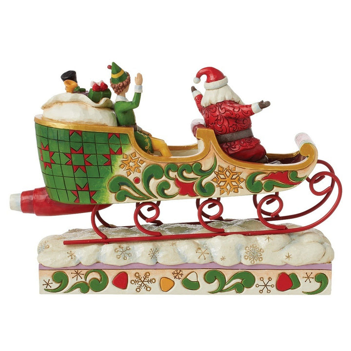 Jim Shore Elf: Buddy Elf with Santa in Sleigh Figurine sparkle-castle