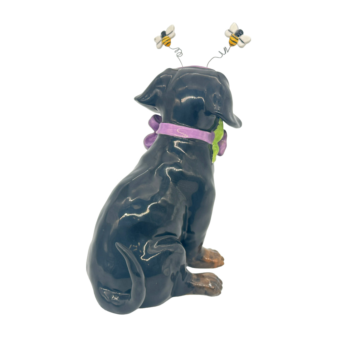 Blue Sky Clayworks: Easter Black Lab With Floral Collar Figurine sparkle-castle