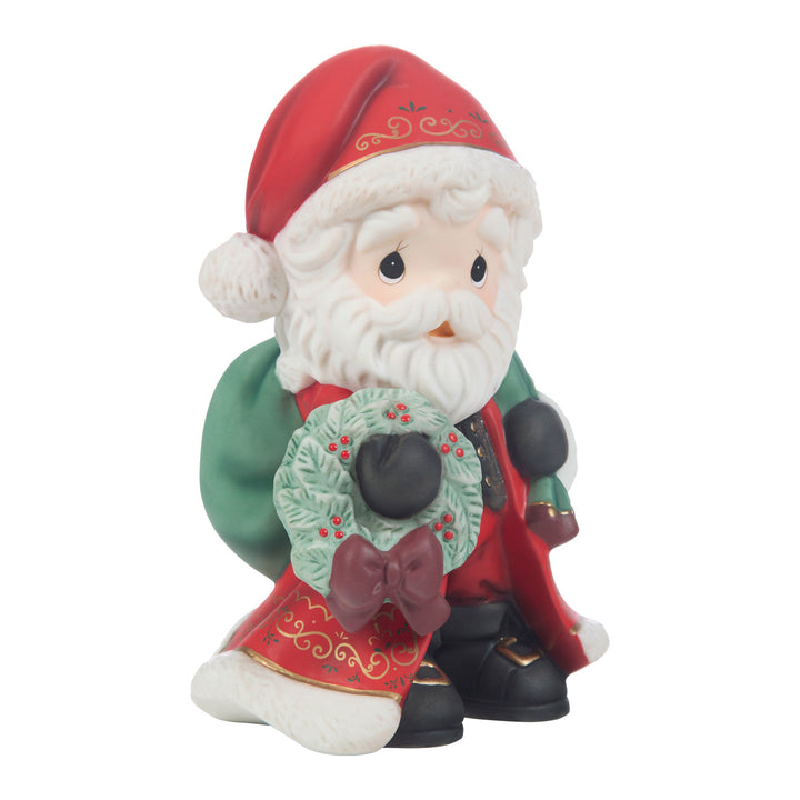 Precious Moments: Annual Christmas Santa With Wreath Figurine sparkle-castle