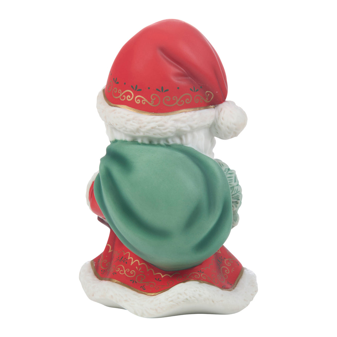 Precious Moments: Annual Christmas Santa With Wreath Figurine sparkle-castle