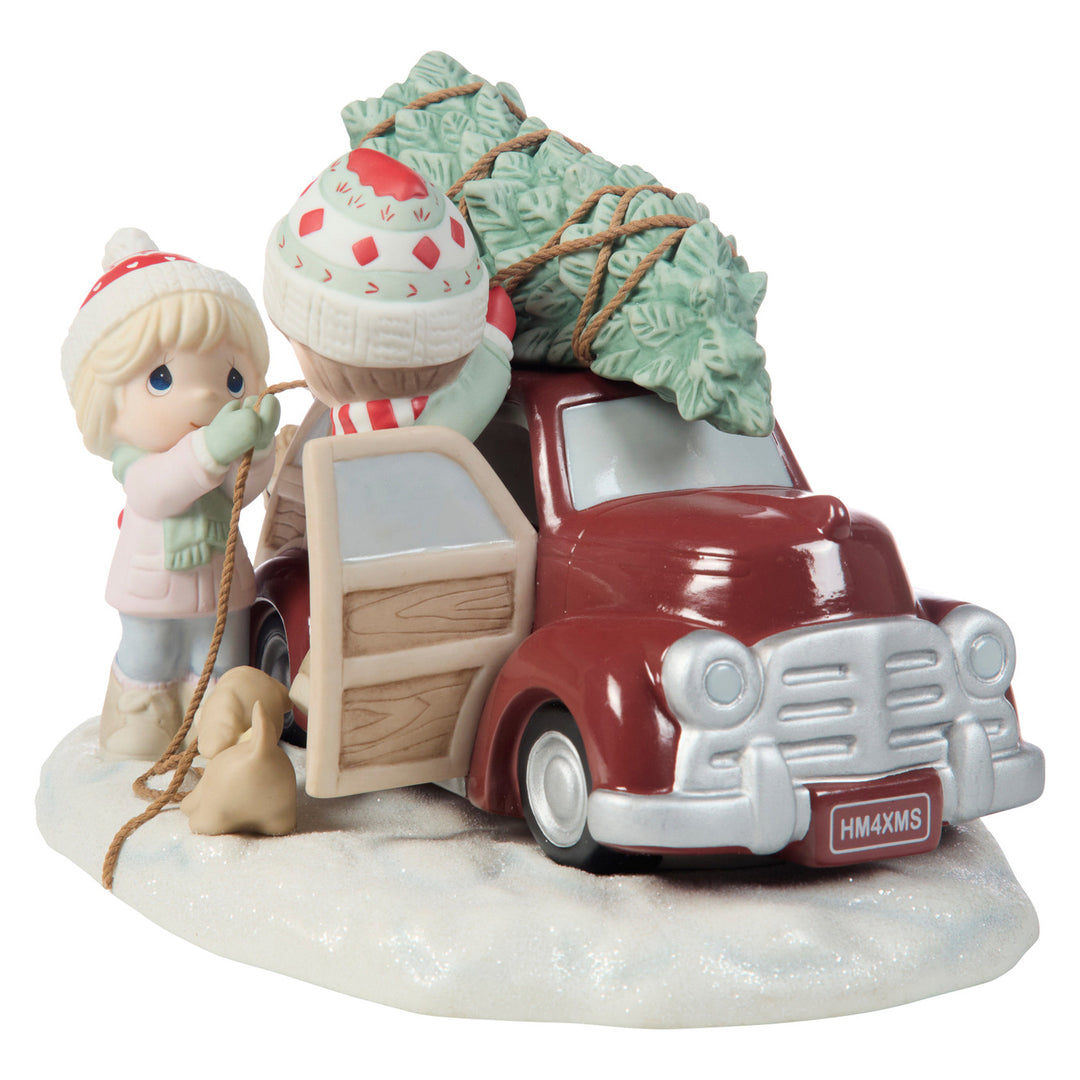 Precious Moments: Couple Taking Home A Christmas Tree Limited Edition Figurine sparkle-castle