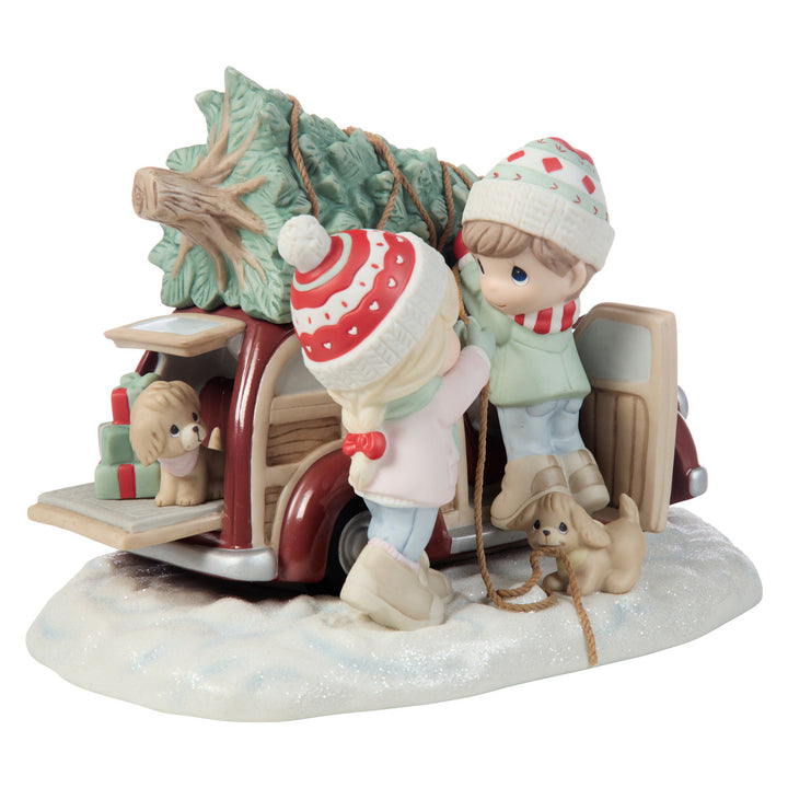 Precious Moments: Couple Taking Home A Christmas Tree Limited Edition Figurine sparkle-castle