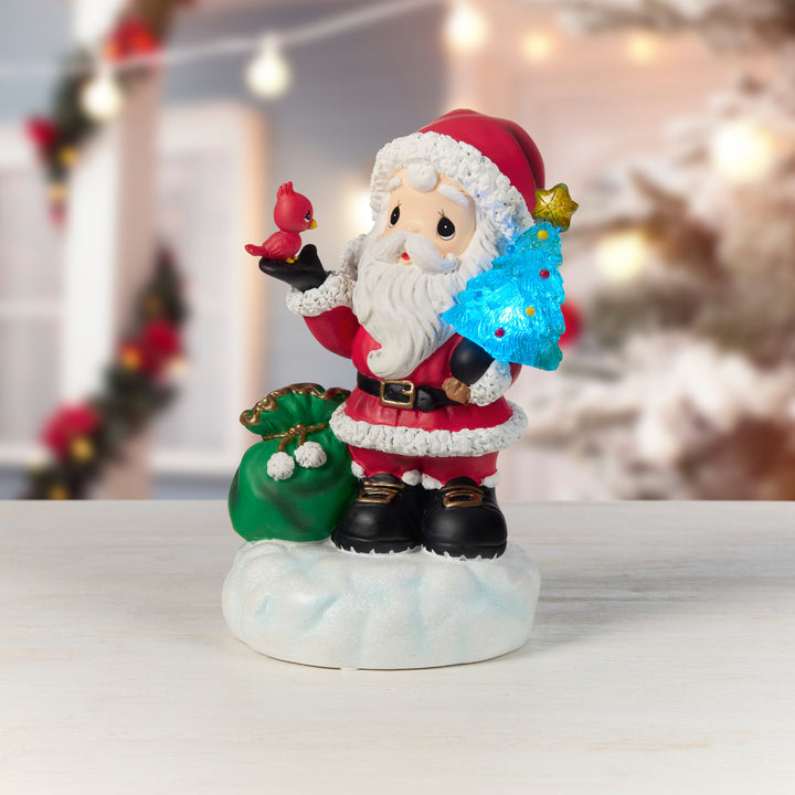 Precious Moments: Santa Holding Cardinal and Lit Christmas Tree Figurine sparkle-castle