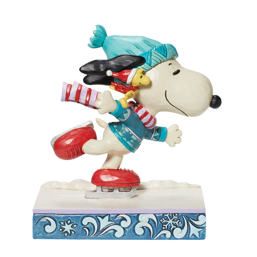 Jim Shore Peanuts: Snoopy and Woodstock Ice Skating Figurine sparkle-castle