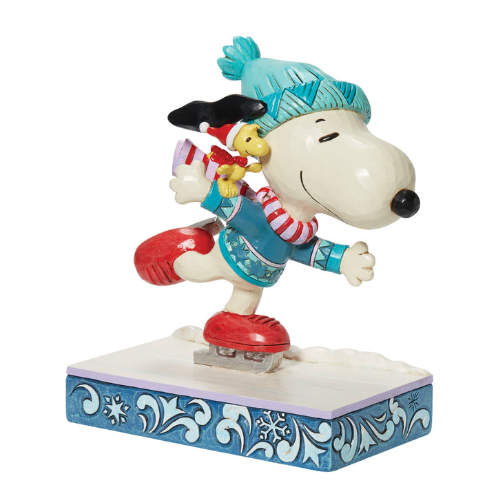 Jim Shore Peanuts: Snoopy and Woodstock Ice Skating Figurine sparkle-castle