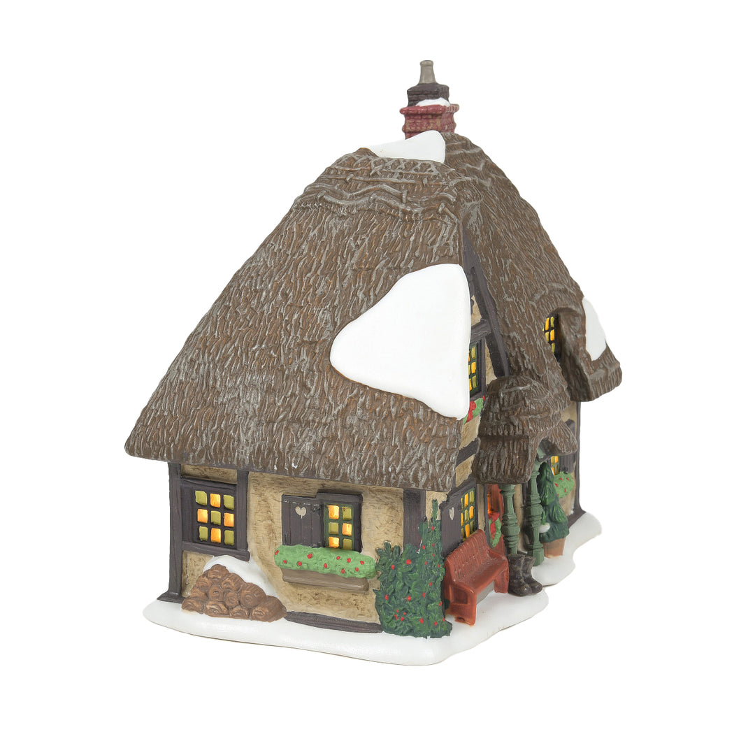 Department 56 Dickens Snow Village: Master Thatcher's Cottage sparkle-castle