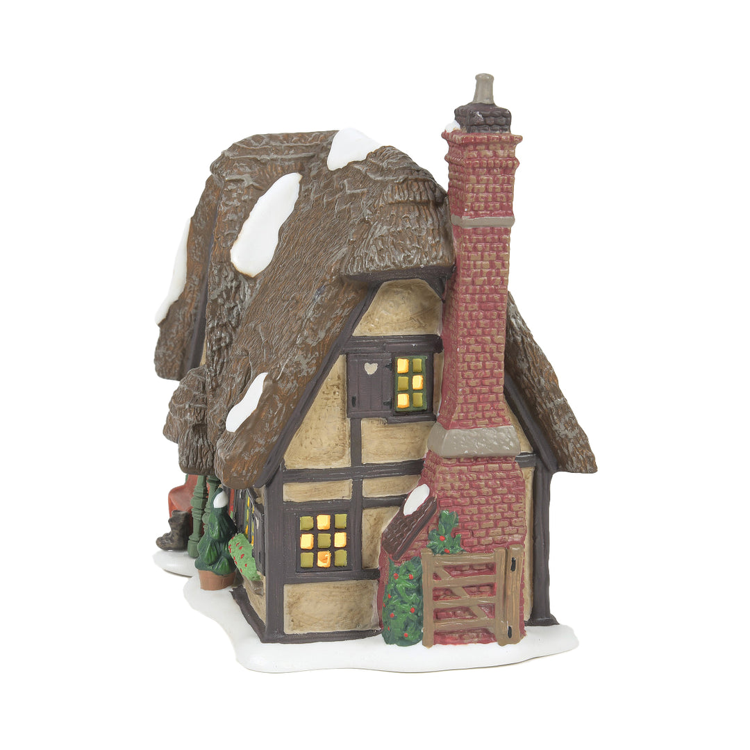 Department 56 Dickens Snow Village: Master Thatcher's Cottage sparkle-castle