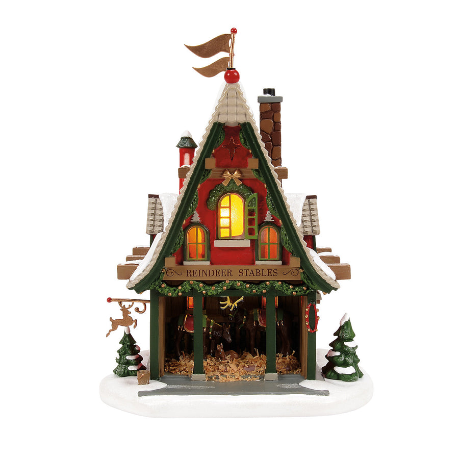 Department 56 North Pole Series: 50th Reindeer Acres Stable sparkle-castle
