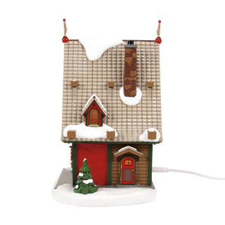 Department 56 North Pole Series: 50th Reindeer Acres Stable sparkle-castle