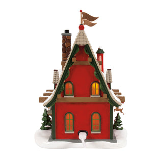 Department 56 North Pole Series: 50th Reindeer Acres Stable sparkle-castle