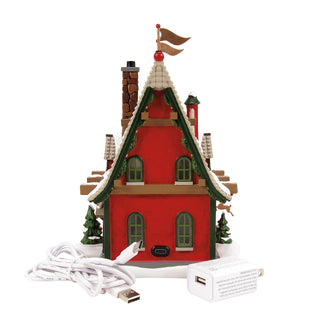 Department 56 North Pole Series: 50th Reindeer Acres Stable sparkle-castle