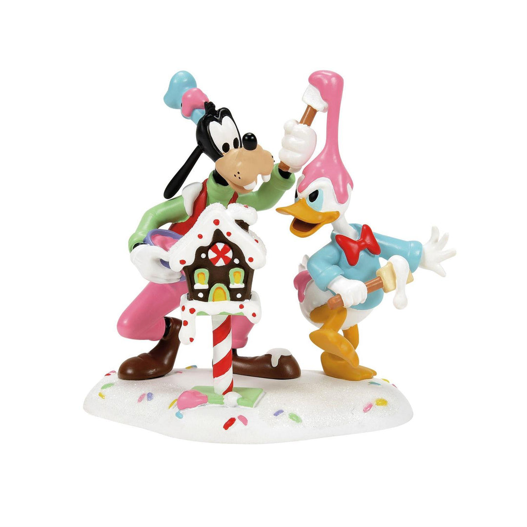 Department 56 Disney Snow Village Accessory: Goofy & Donald Make A Mess sparkle-castle