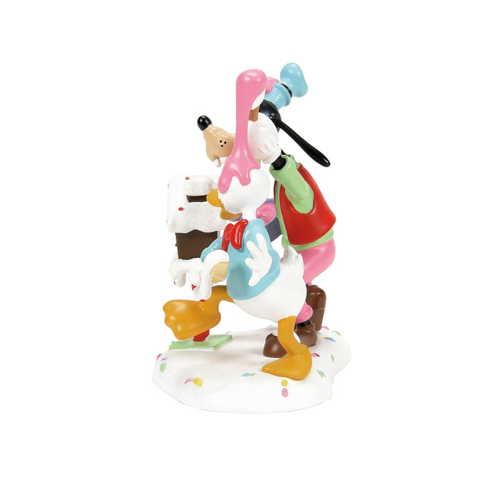 Department 56 Disney Snow Village Accessory: Goofy & Donald Make A Mess sparkle-castle