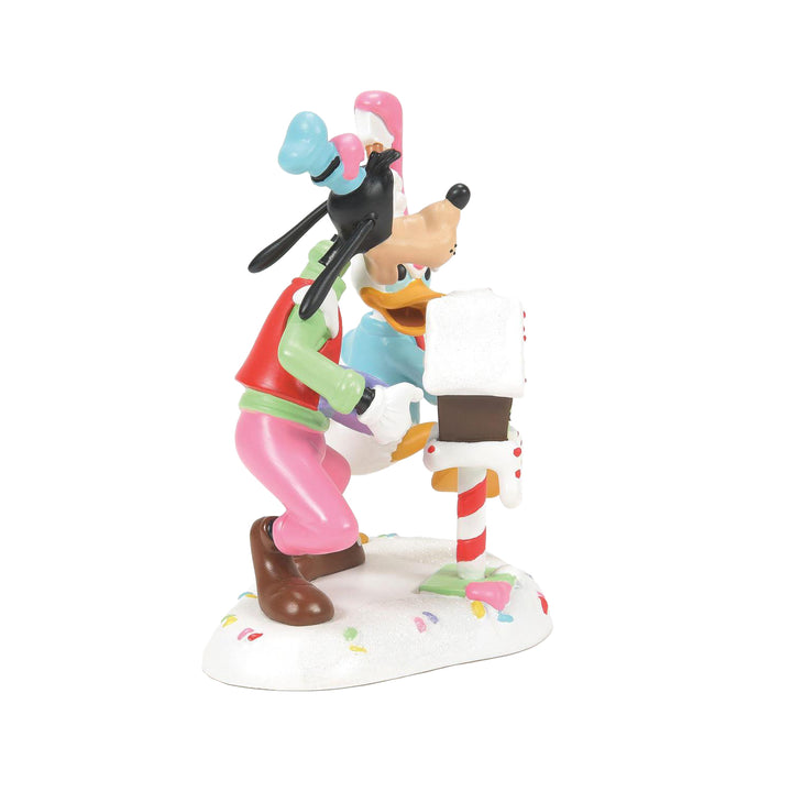 Department 56 Disney Snow Village Accessory: Goofy & Donald Make A Mess sparkle-castle