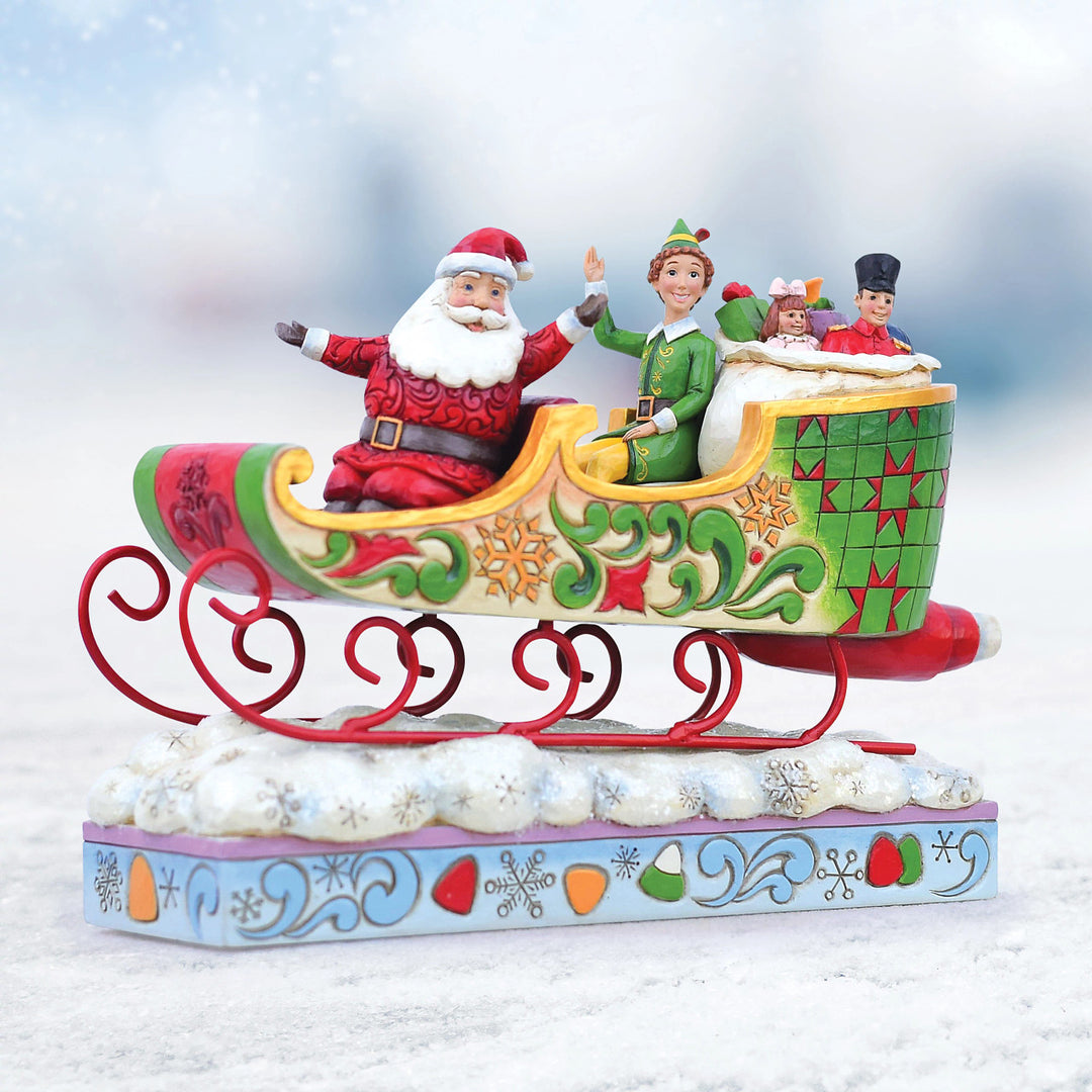 Jim Shore Elf: Buddy Elf with Santa in Sleigh Figurine sparkle-castle