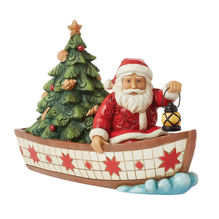 Jim Shore Heartwood Creek: Santa in Boat With Tree Figurine sparkle-castle