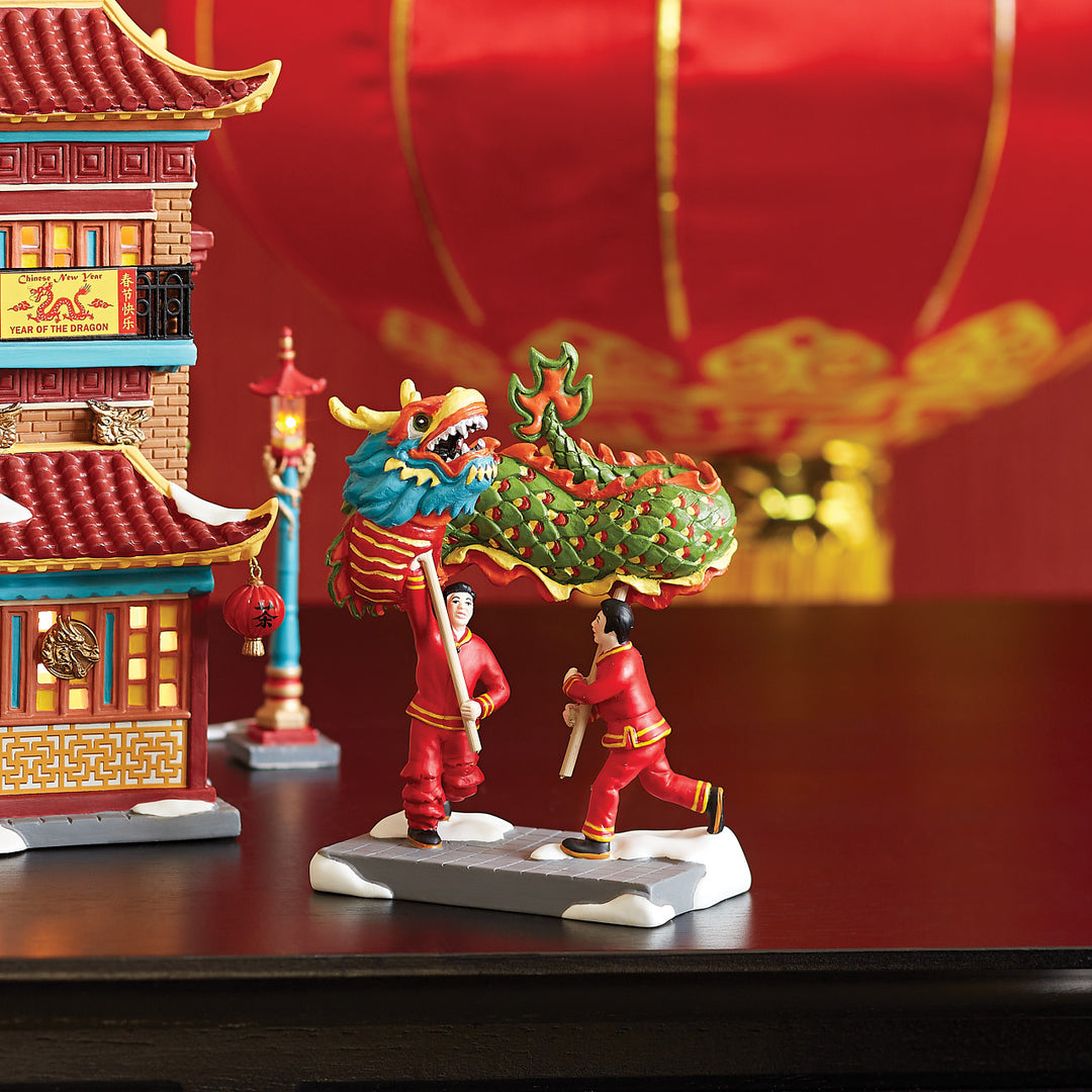Department 56 Christmas in The City Village Accessory: Chinese Dragon Dance sparkle-castle