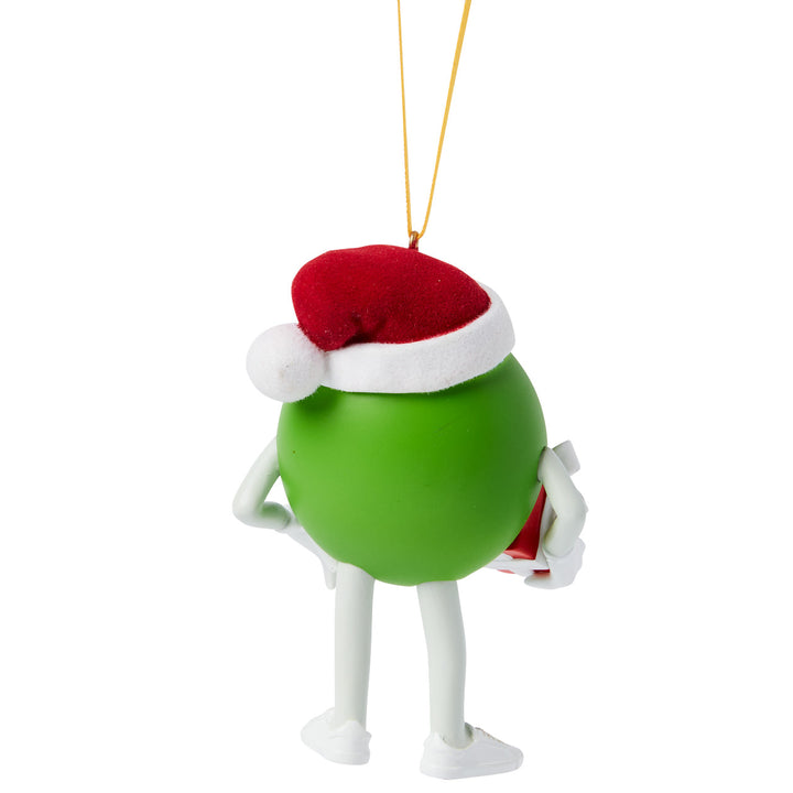 Studio Brands: Green M&M Holding A Gift Hanging Ornament sparkle-castle