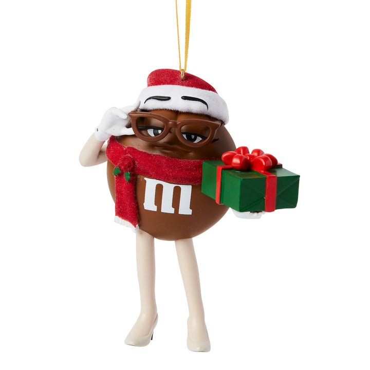 Studio Brands: Brown M&M Holding A Gift Hanging Ornament sparkle-castle