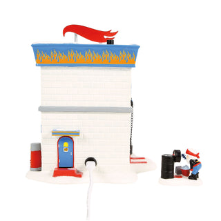 Department 56 North Pole Series: Hot Wheels Detail Center, Set of 2 sparkle-castle