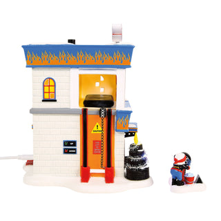 Department 56 North Pole Series: Hot Wheels Detail Center, Set of 2 sparkle-castle