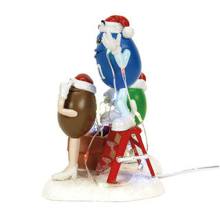 Department 56 North Pole Series Accessory: Light Duty M&Ms sparkle-castle