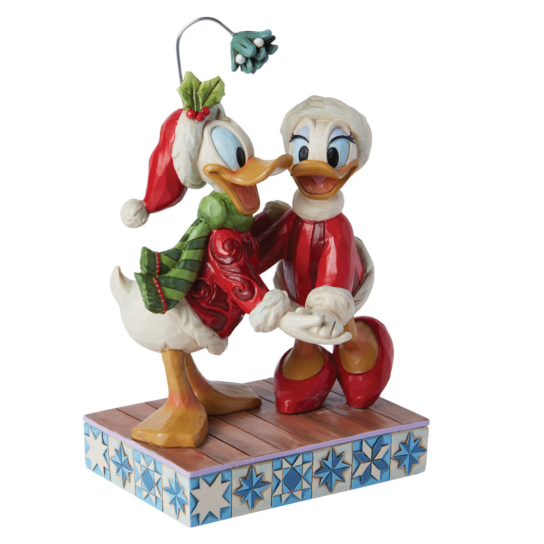 Jim Shore Disney Traditions: Donald & Daisy Under Mistletoe Figurine sparkle-castle