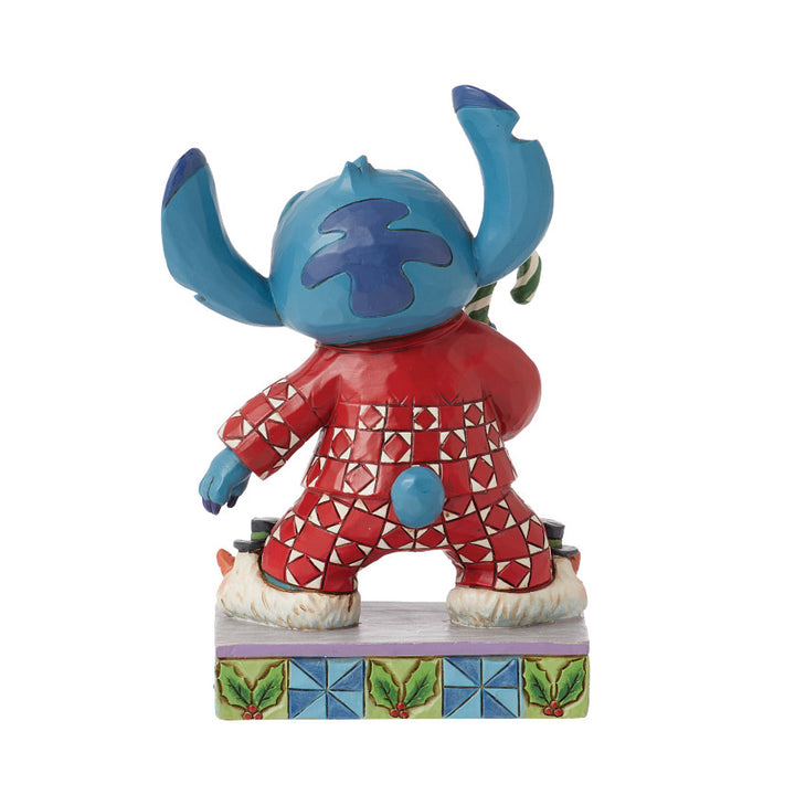 Jim Shore Disney Traditions: Stitch In Christmas PJ's Personality Pose Figurine sparkle-castle