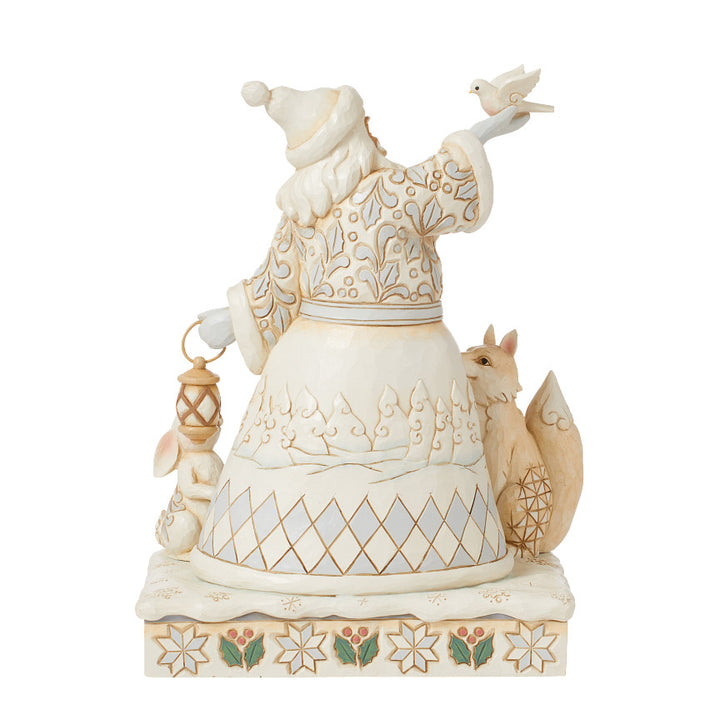 Jim Shore Heartwood Creek: White Woodland Santa Holding Dove and Lantern Figurine sparkle-castle