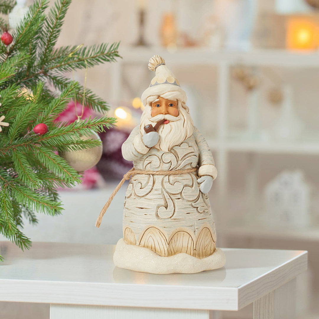 Jim Shore Heartwood Creek: White Woodland Santa With Pipe Figurine sparkle-castle