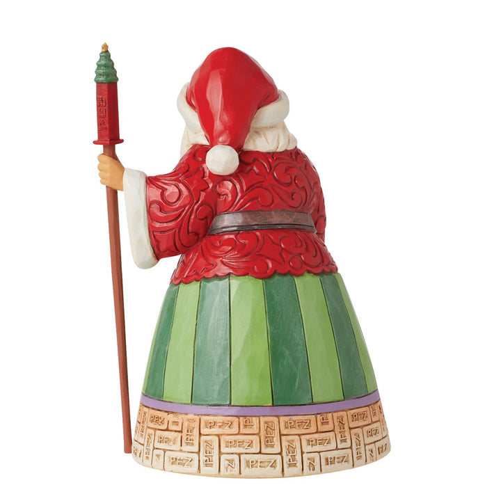 Jim Shore PEZ: Santa Holding Gift Bag Filled With PEZ Figurine sparkle-castle