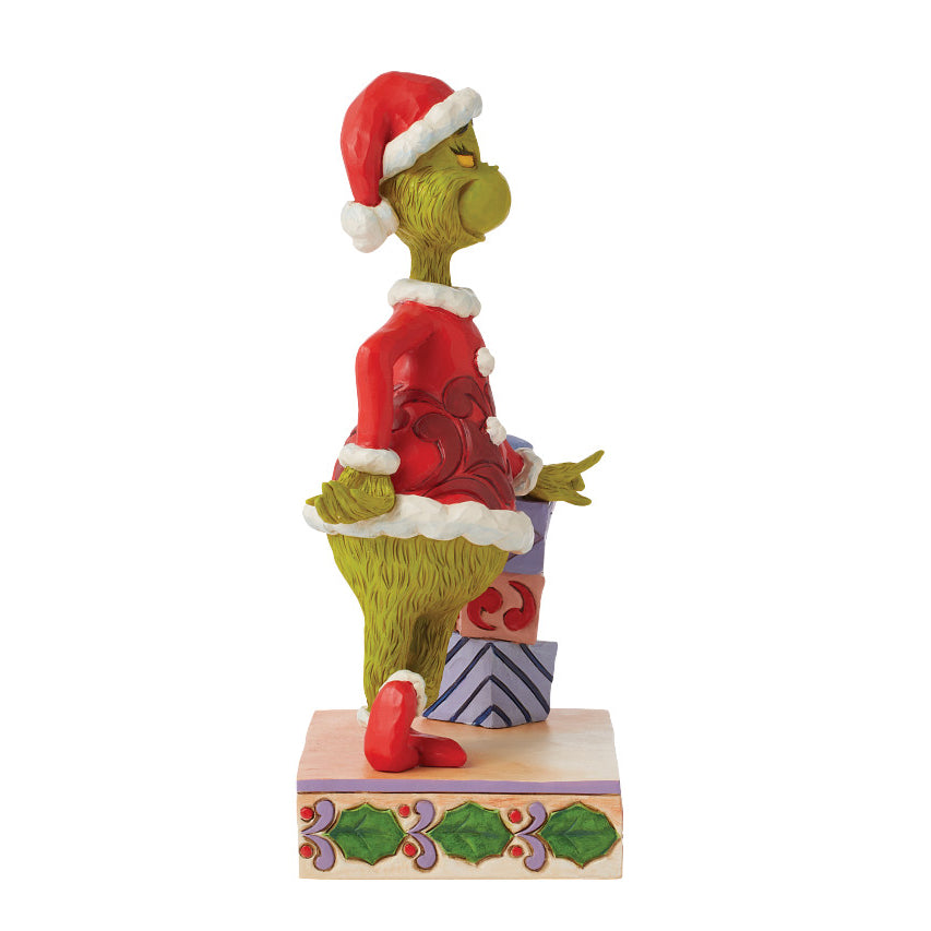 Grinch Collection Jim Shore The Grinch: Grinch Leaning On Presents Figurine – Sparkle Castle